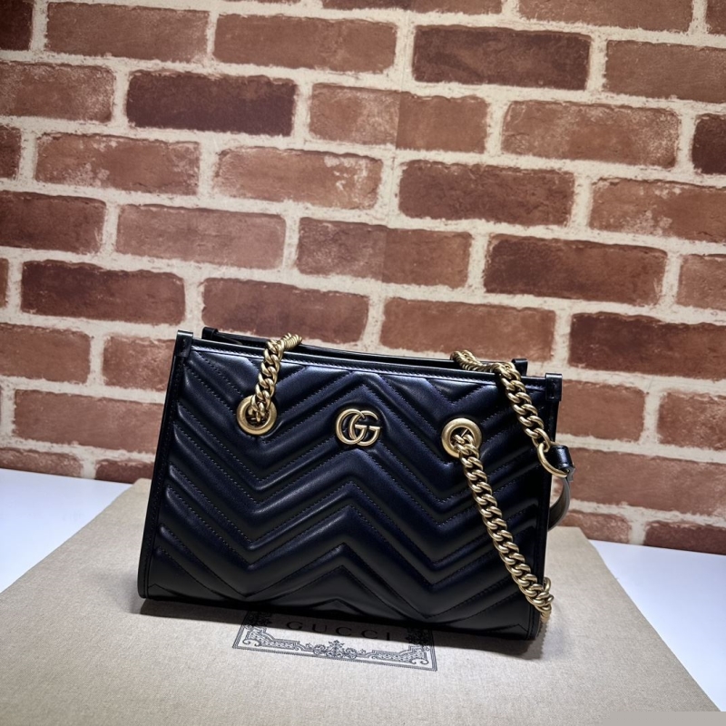 G*u*i shopping bags
